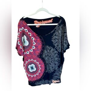 Desigual top with printed motifs and embroidered logo. Size medium.